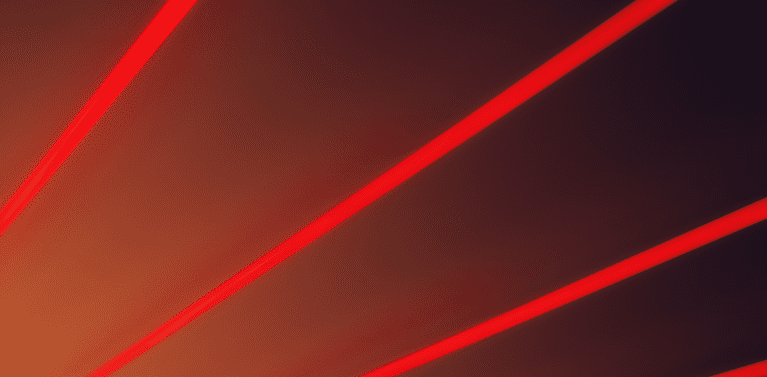 image of a black background with an orange tinge. diagonal red ray stripes